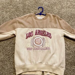 Los Angeles Crewneck Brand:Primark. Size: 9-10yrs.  Color: Beige